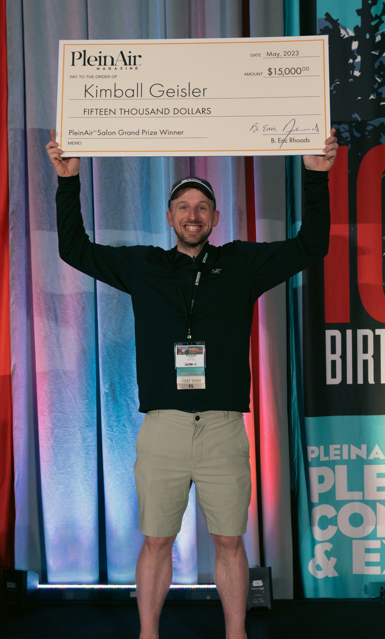 12th Annual PleinAir salon Online Art Competition Grand Prize Winner Kimball Geisler holding his $15,000 check