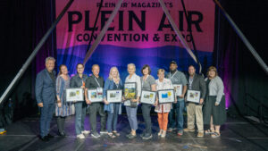 13th Annual PleinAir Salon winners on stage at the Plein Air Convention with publisher Eric Rhoads and editor Kelly Kane