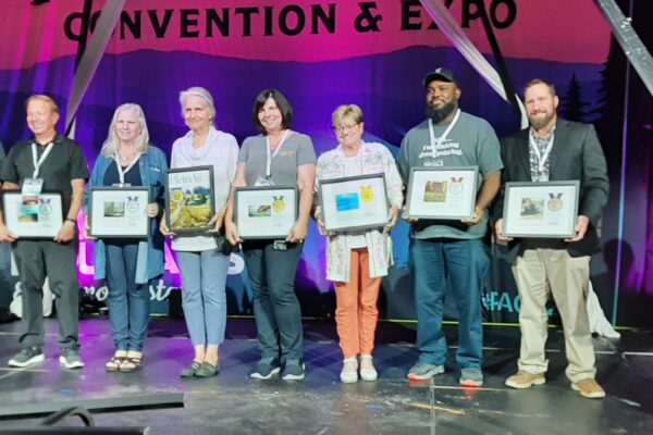 13th Annual PleinAir Salon winners on stage at the Plein Air Convention