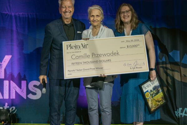 Plein Air Publisher Eric Rhoads and Plein Air Salon MAnager Kari Stober presenting the PleinAir Salon Annual Grand Prize to Camille Przewodek