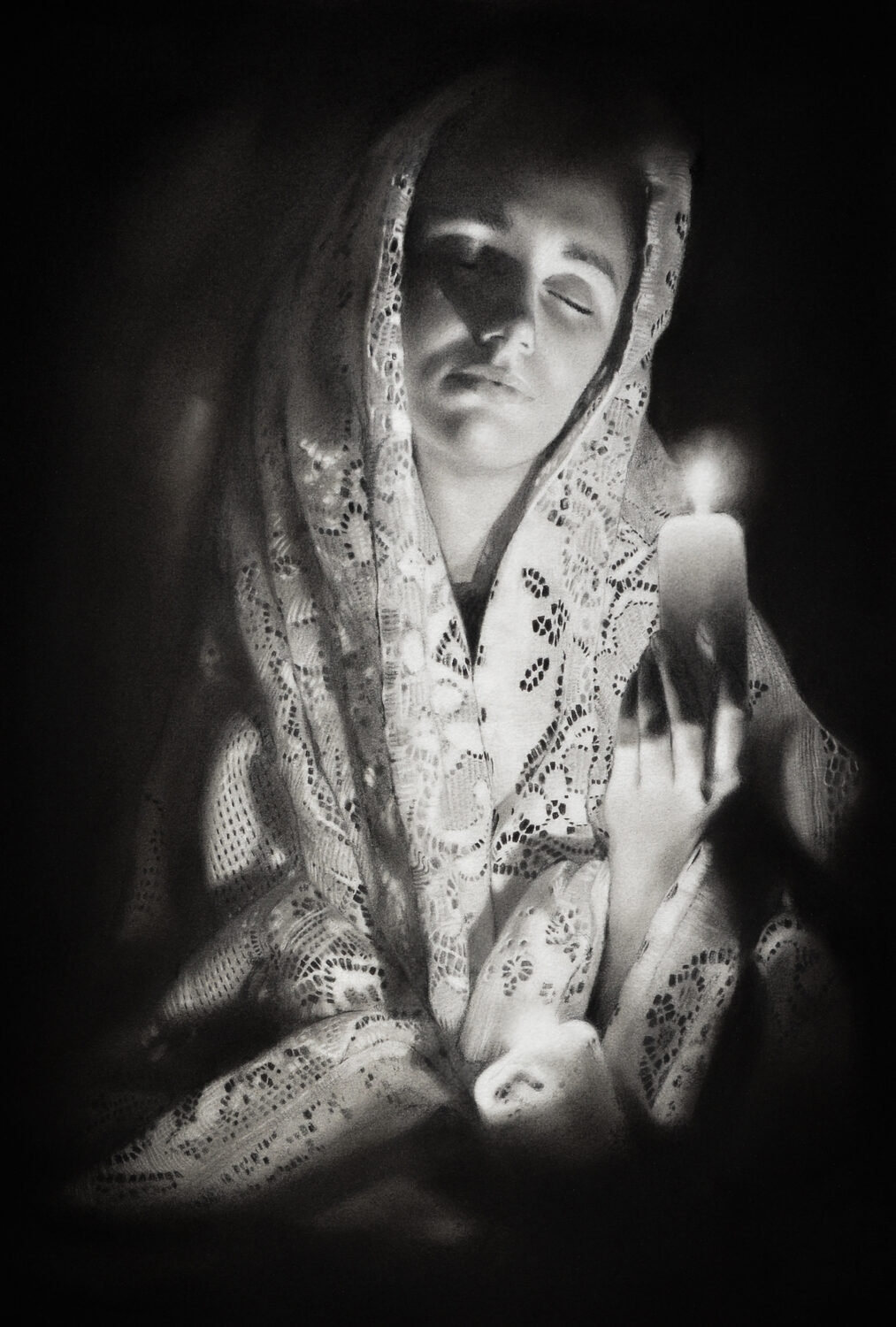 A person draped in a lace veil holds a lit candle close, eyes closed, surrounded by soft shadows and gentle light in a peaceful, contemplative setting. 15th Annual PleinAir Salon Art Competition