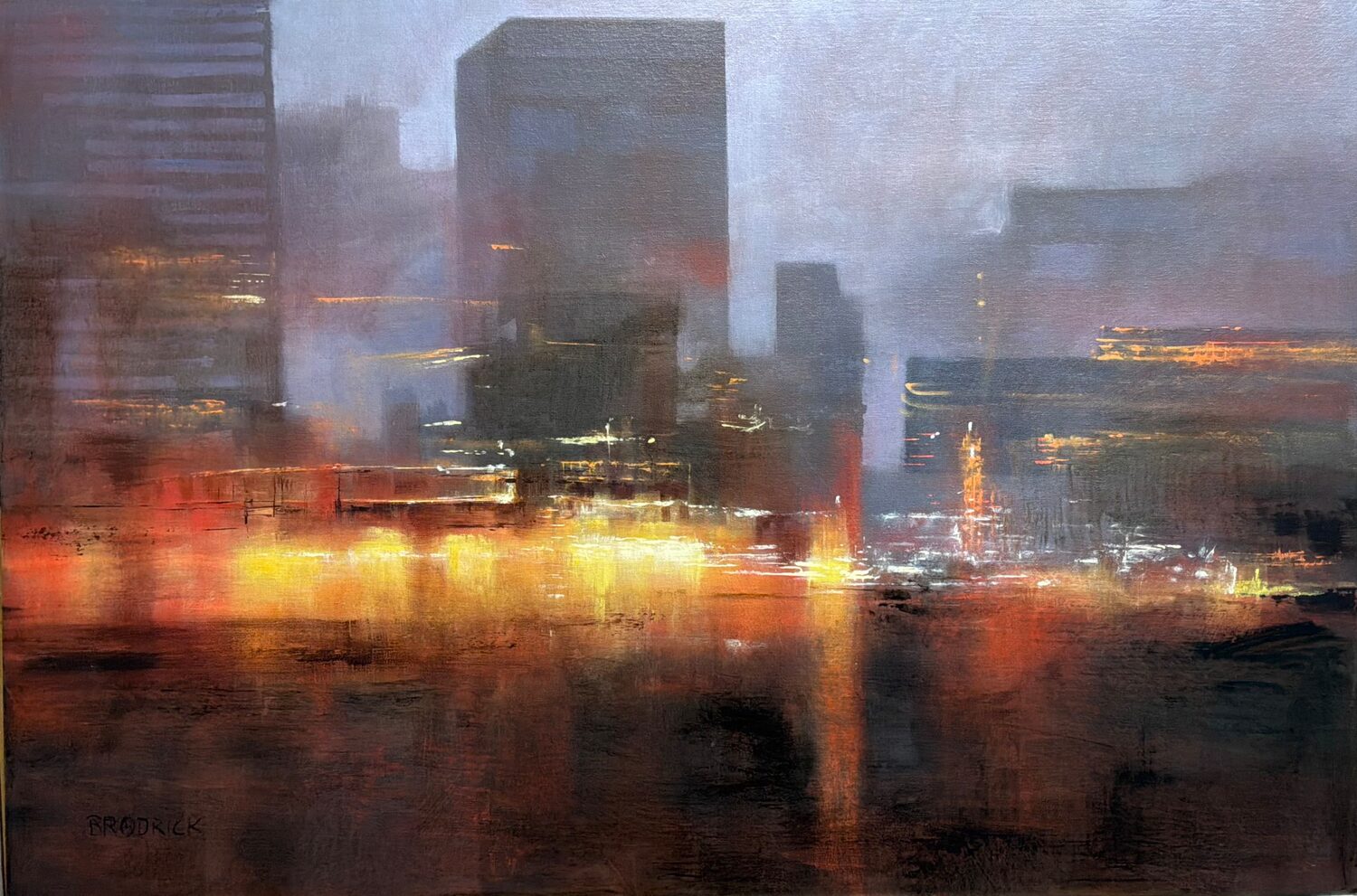 A hazy cityscape painting with tall, dark buildings and blurred yellow-orange lights reflecting on wet streets, creating a moody, atmospheric effect. 15th Annual PleinAir Salon Art Competition