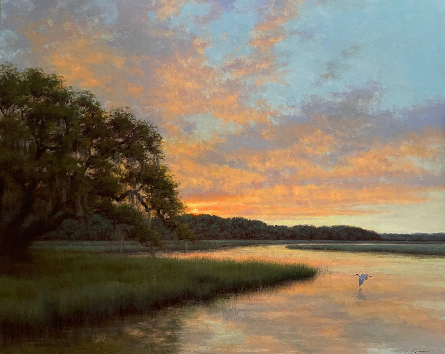 A serene sunset over a calm river, with soft clouds in the sky, a large tree on the left, lush green grass, and a lone bird flying low over the water. 15th Annual PleinAir Salon Art Competition