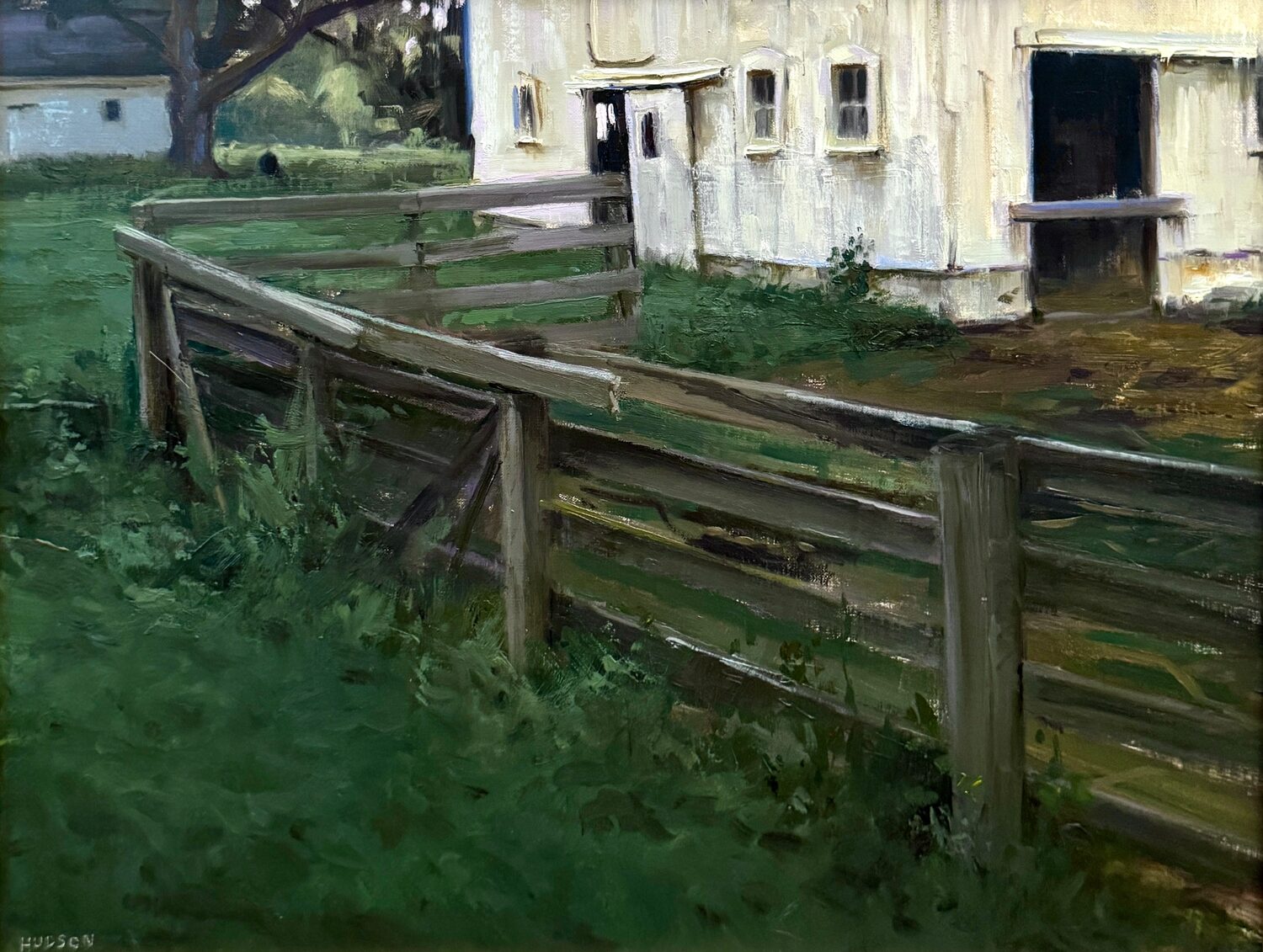 A wooden fence runs through green grass towards a white barn with open doors and windows. Trees and additional greenery are visible in the background. 15th Annual PleinAir Salon Art Competition
