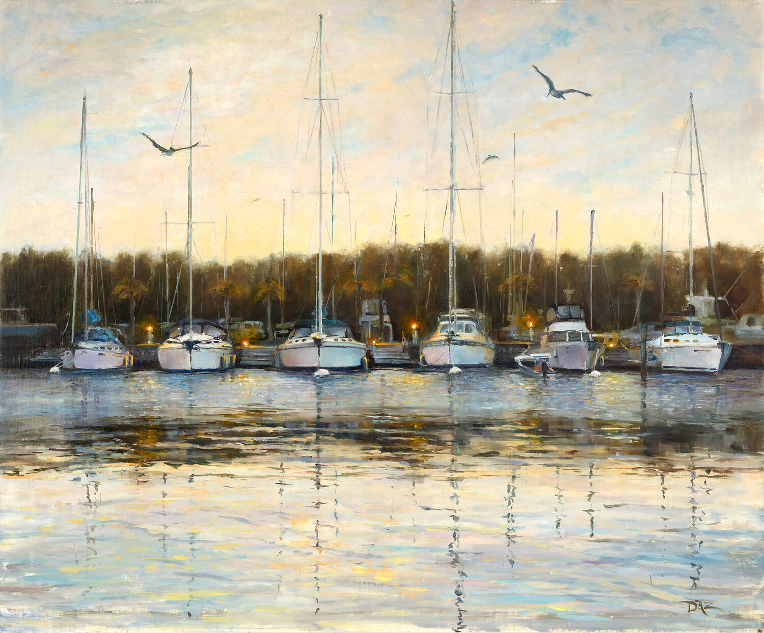 Several sailboats and yachts are docked at a marina under a soft, pastel sunset sky. Birds are flying above, and trees line the background, with calm water reflecting boats and lights. 15th Annual PleinAir Salon Art Competition