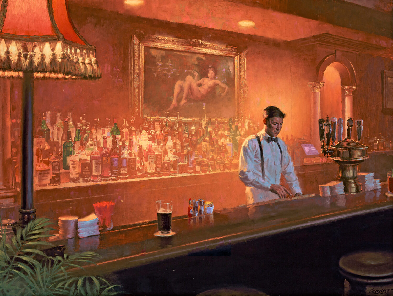 A bartender in a white shirt and bow tie stands behind a dimly lit bar filled with bottles. Warm lighting, a large lamp, and a classic painting create a cozy, vintage atmosphere. 15th Annual PleinAir Salon Art Competition